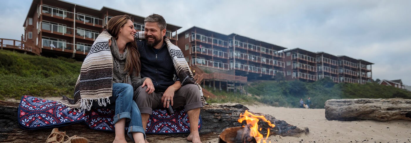Couple with beach fire